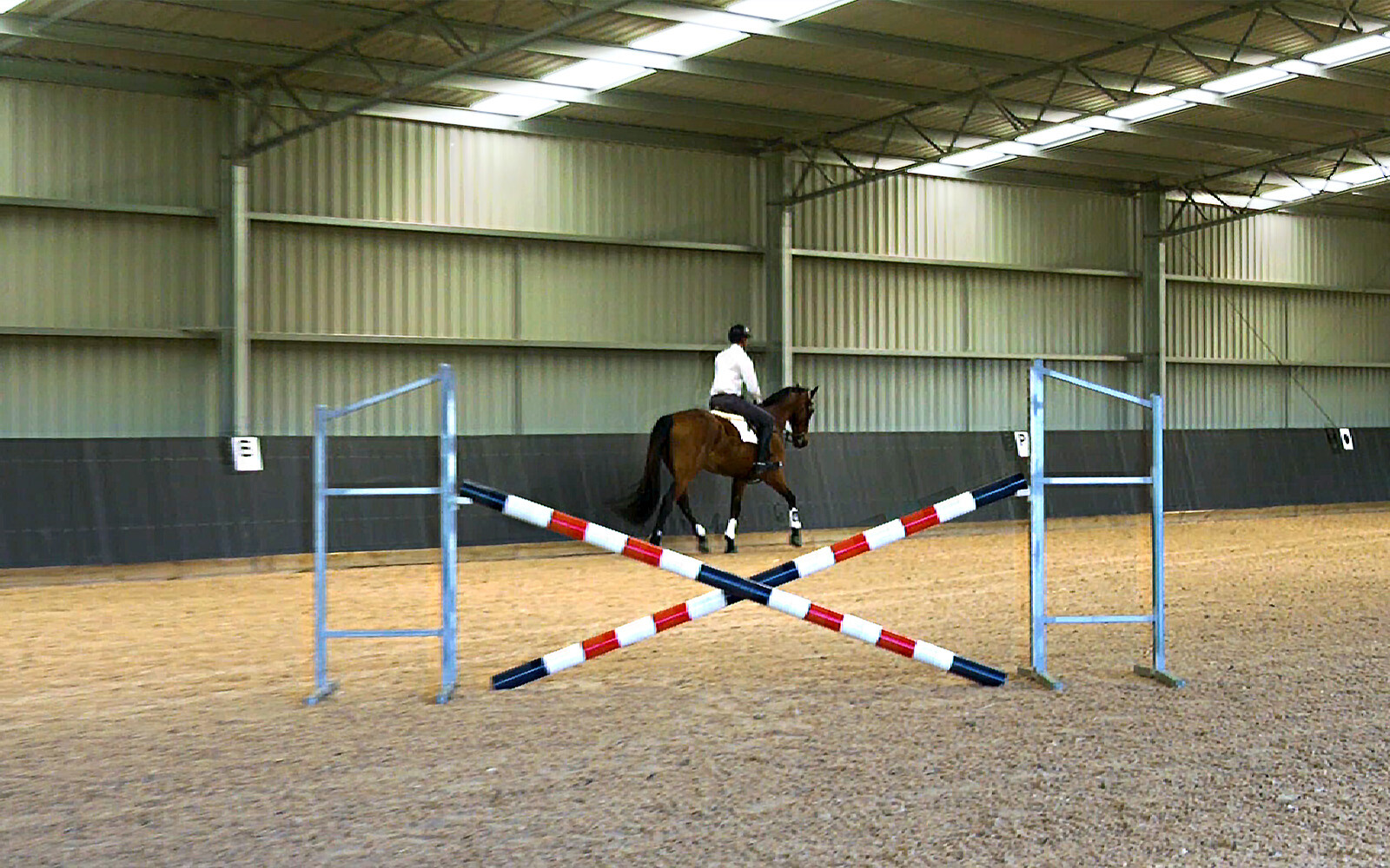 Deon Stokes indoor jumping arena 