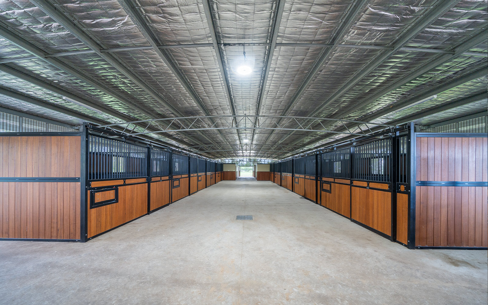 Robyn Boyle combined indoor arena and stable complex